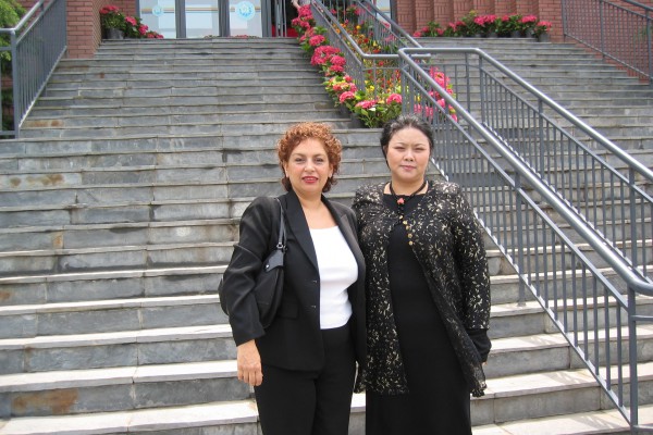Dalian, China 2006: Sheri and the principal of No 7 Middle School Dalian Development Zone after training